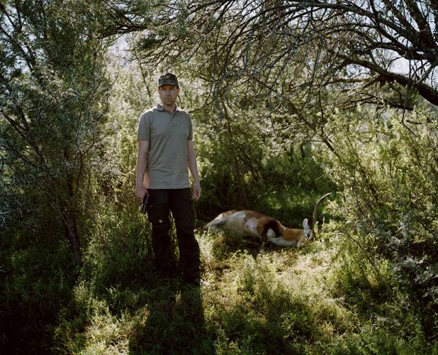 untitled hunter, hand gun and lechwe, eastern cape, south africa